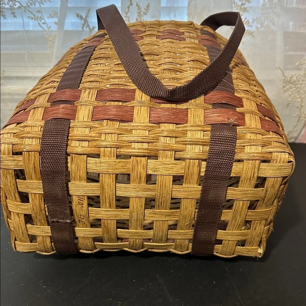 Woven vegetable basket with handles — carrot plaque decor